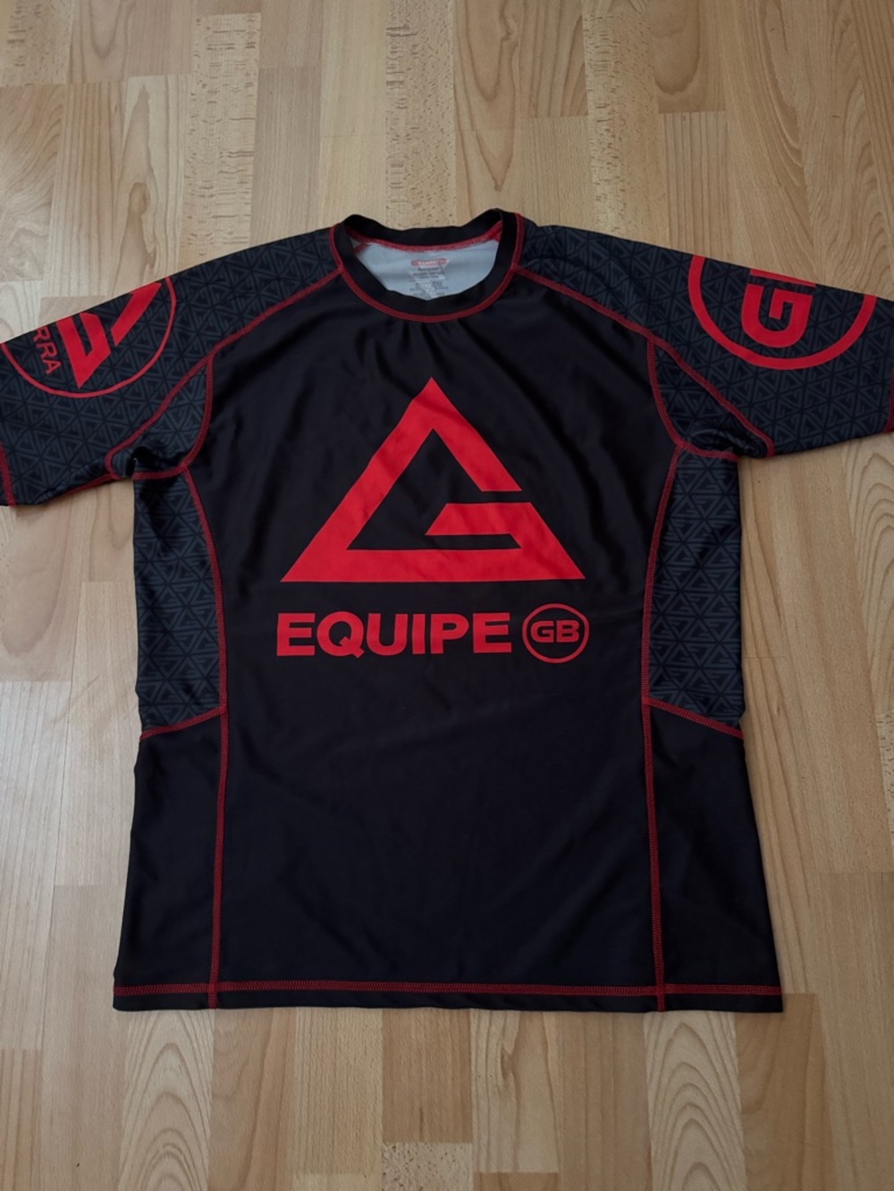 Equipe GB Men's Black and Red Short-Sleeve. Husband purchased for jiu-jitsu.